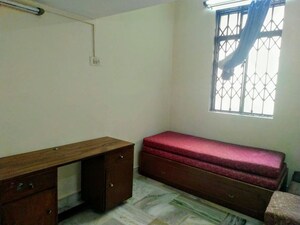 Bedroom in 2 BHK Apartment at Citizens CHS, Kandivali West – for Rent