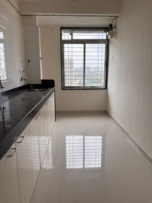 Kitchen in 2 BHK Apartment at Shree Sai Datta CHS, Matunga West – for Rent
