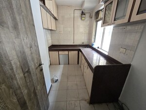 Kitchen in 2 BHK Apartment at Vasant Sagar, Kandivali East – for Rent