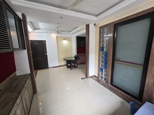 Living Room in 2 BHK Apartment at Vasant Sagar, Kandivali East – for Rent
