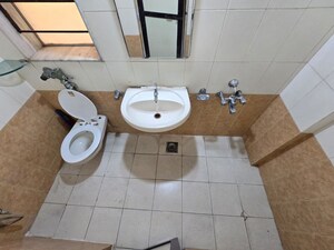 Bathroom in 2 BHK Apartment at Vasant Sagar, Kandivali East – for Rent