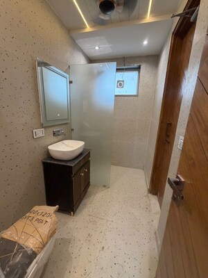Bathroom in 4 BHK Builder Floor at Puri Aman Vilas, Sector 89 – for Sale