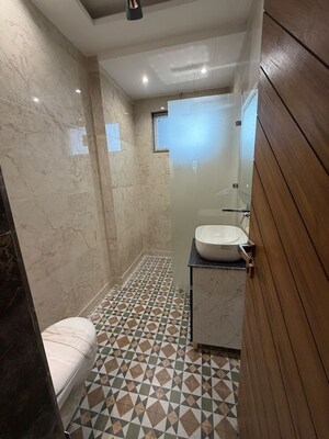 Bathroom in 4 BHK Builder Floor at Puri Aman Vilas, Sector 89 – for Sale