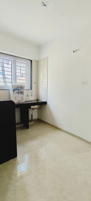 Kitchen in 1 BHK Apartment at Wadgaon Sheri – for Rent