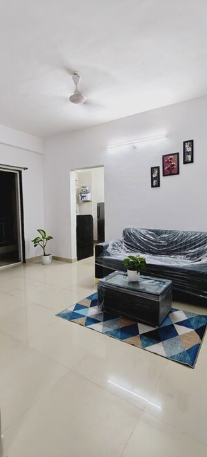 Living Room in 1 BHK Apartment at Wadgaon Sheri – for Rent