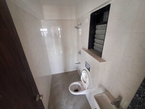 Bathroom in 3 BHK Apartment at Roswalt Ray, Dahisar East – for Rent