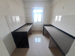Kitchen in 3 BHK Apartment at Roswalt Ray, Dahisar East – for Rent