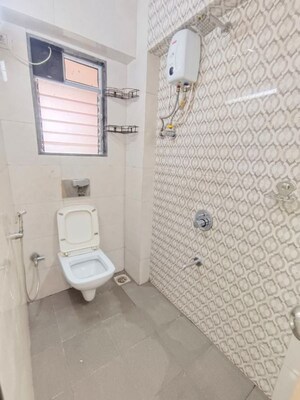 Bathroom in 1 BHK Apartment at Aarti Kripa CHS, Dahisar West – for Rent