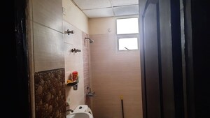 Bathroom in 3 BHK Apartment at Vibhuti Khand – for Sale