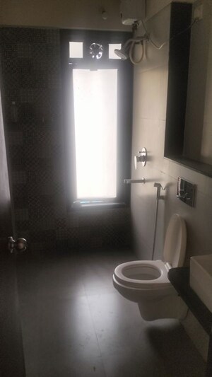 Bathroom in 3 BHK Apartment at Sunshree Woods, Nibm Road – for Rent