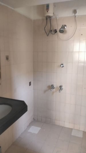 Bathroom in 3 BHK Apartment at Sunshree Woods, Nibm Road – for Rent