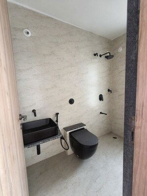 Bathroom in 4 BHK Apartment at Unique K Town, Kiwale – for Rent