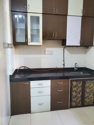 Kitchen in 2 BHK Apartment at Sheth Vasant Lawns, Laxmi Nagar – for Sale