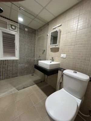 Bathroom in 3 BHK Apartment at Brigade Orchards Juniper, Devanahalli – for Rent