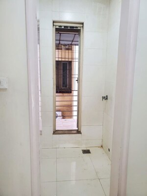 Bathroom in 2 BHK Apartment at Sheth Vasant Lawns, Laxmi Nagar – for Rent