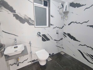 Team Area in 2 BHK Apartment at Rockline The Meridian Towers, Ghatkopar West – for Sale