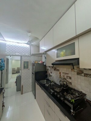 Kitchen in 2 BHK Apartment at Gokuldham Complex, Goregaon East – for Rent
