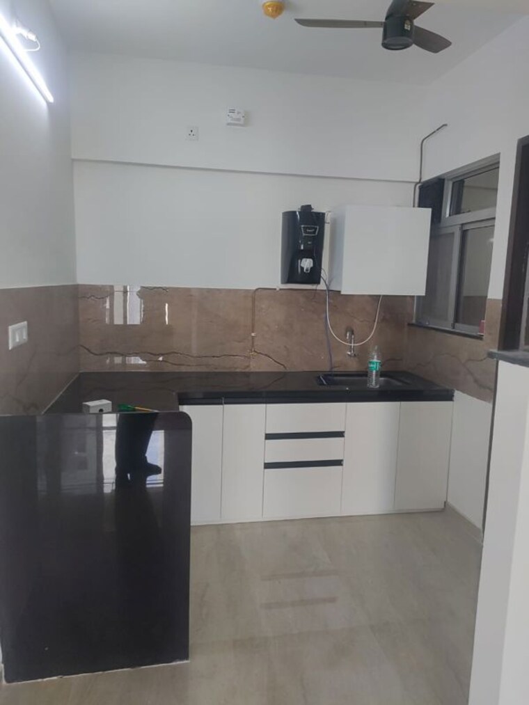 Kitchen, kolte-patil-life-republic-aros 2 Bedroom 836 Sq.Ft. Apartment In Hinjewadi Pune 10775517