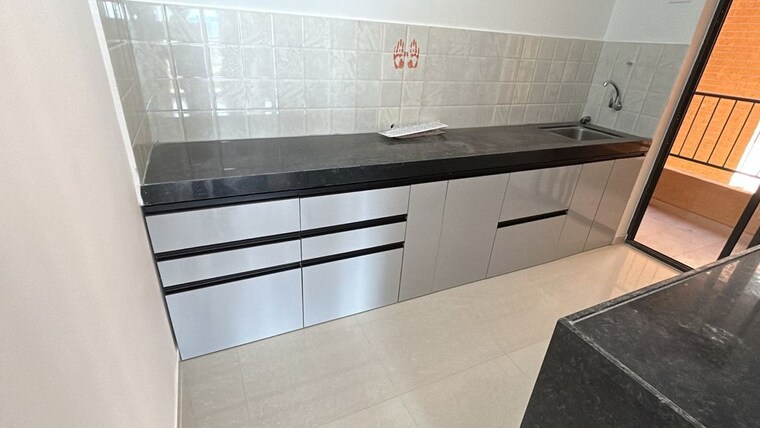 Kitchen, shapoorji-pallonji-joyville-hadapsar-annexe 2.5 Bedroom 815 Sq.Ft. Apartment In Hadapsar Pune 10775528