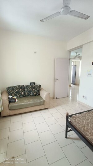 Living Room in 1 BHK Apartment at Maple Heights, Sector 43 – for Rent