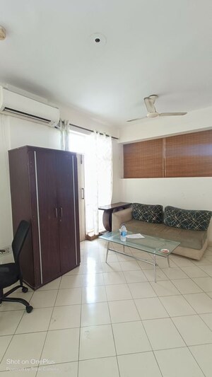 Living Room in 1 BHK Apartment at Maple Heights, Sector 43 – for Rent