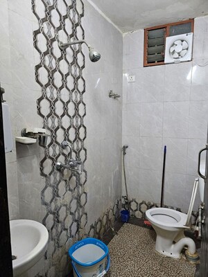 Bathroom in 2 BHK Apartment at Sarai Nandan – for Rent