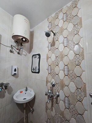 Bathroom in 2 BHK Apartment at Sarai Nandan – for Rent