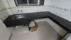 Kitchen in 2 BHK Apartment at Rakshak Nagar Gold, Kharadi – for Rent