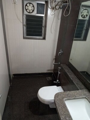 Bathroom in 1 BHK Apartment at Kalpataru Hills Phase II, Manpada – for Rent