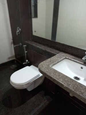 Bathroom in 1 BHK Apartment at Kalpataru Hills Phase II, Manpada – for Rent