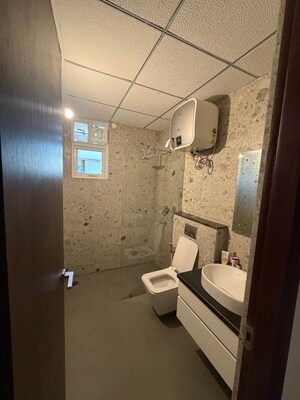 Bathroom in 3 BHK Apartment at Maya Green Lotus Utsav, International Airport Road – for Rent