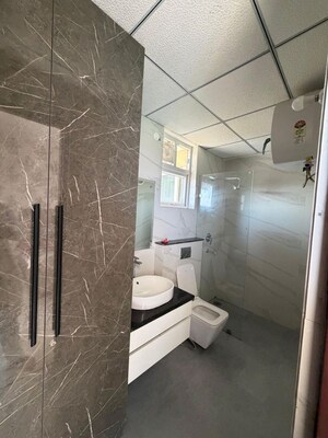 Bathroom in 3 BHK Apartment at Maya Green Lotus Utsav, International Airport Road – for Rent