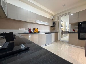 Kitchen in 3 BHK Apartment at Maya Green Lotus Utsav, International Airport Road – for Rent