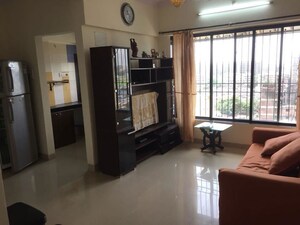 Living Room in 1 BHK Apartment at Fairmont La Paradiso, Santacruz East – for Sale