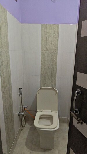 Bathroom in 3 BHK Builder Floor at Mahindra Enclave – for Sale