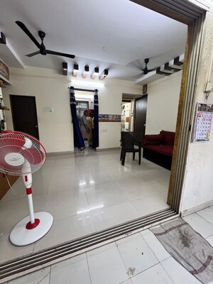 Living Room in 2 BHK Apartment at Joy Rising, Kharghar – for Sale