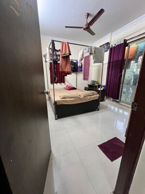 Room in 2 BHK Apartment at Joy Rising, Kharghar – for Sale