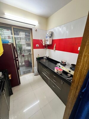 Kitchen in 2 BHK Apartment at Joy Rising, Kharghar – for Sale