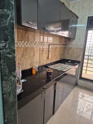 Kitchen in 2 BHK Apartment at Paradise  Sai Jewel, Kharghar – for Rent