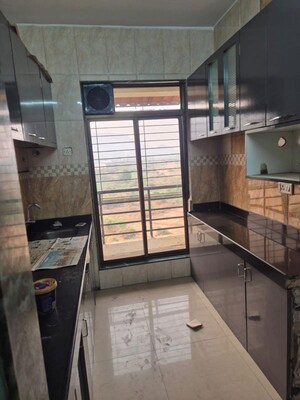 Kitchen in 2 BHK Apartment at Paradise  Sai Jewel, Kharghar – for Rent