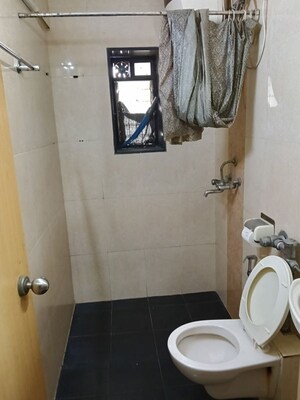 Bathroom in 2 BHK Apartment at Exclusive Apartment, Santacruz West – for Sale