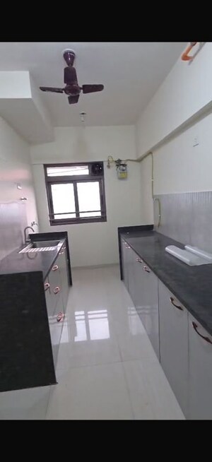 Kitchen in 3 BHK Apartment at Kalpataru Srishti Namaah, Mira Road – for Rent
