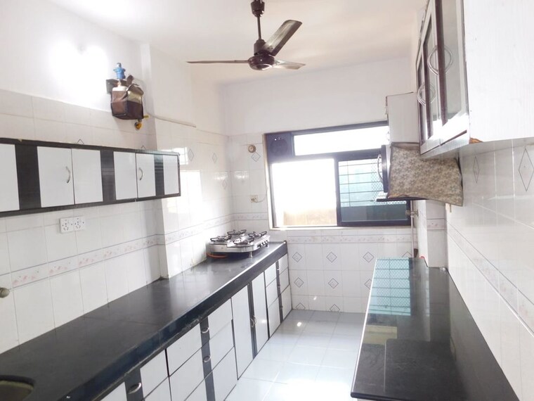 Kitchen, veera desai road 3 Bedroom 1300 Sq.Ft. Apartment In Veera Desai Road Mumbai 10776053