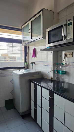 Kitchen in 3 BHK Apartment at Veera Desai Road – for Sale