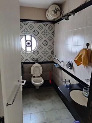 Bathroom in 4 BHK Apartment at Adani Group Western Heights, Andheri West – for Sale