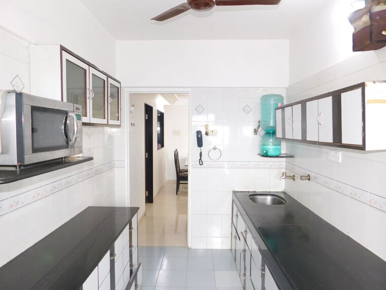 Kitchen, veera desai road 3 Bedroom 1300 Sq.Ft. Apartment In Veera Desai Road Mumbai 10776105