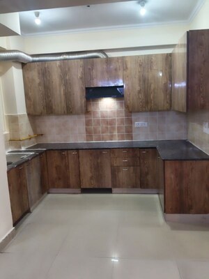 Kitchen in 3 BHK Apartment at Aims Golf City, Sector 75 – for Rent