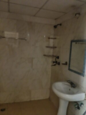 Bathroom in 3 BHK Apartment at Aims Golf City, Sector 75 – for Rent
