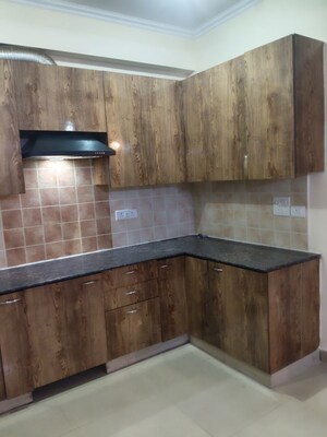 Kitchen in 3 BHK Apartment at Aims Golf City, Sector 75 – for Rent