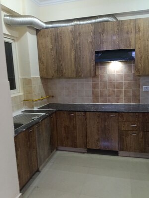 Kitchen in 3 BHK Apartment at Aims Golf City, Sector 75 – for Rent